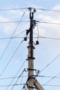 Mast electrical power line against cloud and blue sky Royalty Free Stock Photo