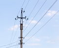 Mast electrical power line against cloud and blue sky Royalty Free Stock Photo