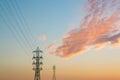 Mast electrical power line against cloud and blue sky. Royalty Free Stock Photo