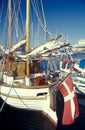 Danish Hasle yacht harbor on Bornholm island with Danish national flag Royalty Free Stock Photo