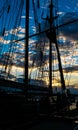 Mast and rope sailboat vessel on sky sunset background