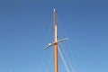 The mast of the yacht against the blue sky Royalty Free Stock Photo