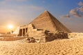 Mastaba of Seshemnefer IV and the Pyramid of Cheops in Giza Royalty Free Stock Photo