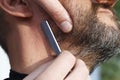 Master barber shears beard man Royalty Free Stock Photo