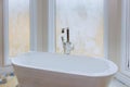 Master bath in new construction home with white tub Royalty Free Stock Photo