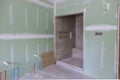 Master Bathroom with new under construction bathroom interior drywall ready for tile Royalty Free Stock Photo