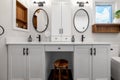 Master bathroom - renovation. detail shoot of cabinetry and dual sinks.