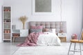 Master bedroom with buttoned headboard