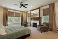 Master bedroom with fireplace Royalty Free Stock Photo