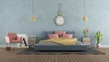 Master bedroom in pastel colors with vintage furniture