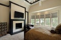 Master bedroom with wall of windows Royalty Free Stock Photo