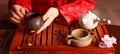 Master conducting traditional tea ceremony at table indoors, closeup. Banner design Royalty Free Stock Photo