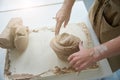 Master works with a large piece of clay Royalty Free Stock Photo