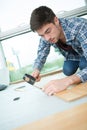 master engaged in installation cork flooring