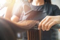 Master hairdresser blow dry client of young woman in spa beauty salon Royalty Free Stock Photo