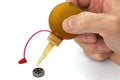 Master lubricates the old bearing of an using a oiler, isolated Royalty Free Stock Photo