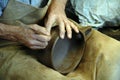 Master potter working a bowl with his own hands