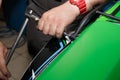 Master sets the trunk on the rear fender of the motorcycle. Replacing the trunk of a motorcycle