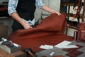 Master sewing leather goods, concept of handmade craft production