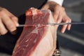 Master slicer cutting iberian cured ham Royalty Free Stock Photo