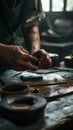 Master tanner in his leather workshop working on a leather wallet