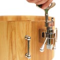 Master tuning new wooden snare drum isolated closeup