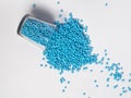 masterbatch granules light blue on a white background, this polymer is a coloring agent used in the plastics industry Royalty Free Stock Photo