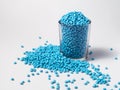 masterbatch granules light blue on a white background, this polymer is a coloring agent used in the plastics industry Royalty Free Stock Photo