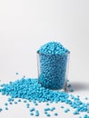 masterbatch granules light blue on a white background, this polymer is a coloring agent used in the plastics industry Royalty Free Stock Photo