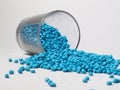 masterbatch granules light blue on a white background, this polymer is a coloring agent used in the plastics industry Royalty Free Stock Photo