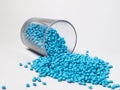 masterbatch granules light blue on a white background, this polymer is a coloring agent used in the plastics industry Royalty Free Stock Photo