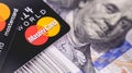 MasterCard and dollars banknotes Royalty Free Stock Photo