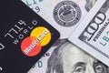 MasterCard and one hundred dollars banknotes. Ekaterinburg, Russ Royalty Free Stock Photo