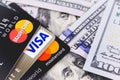 MasterCard and Visa with dollars banknotes Royalty Free Stock Photo