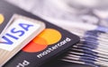 MasterCard and Visa with dollars Royalty Free Stock Photo
