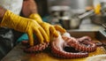 Masterful Precision: An Anonymous Chef\'s Hands Expertly Carving Octopus