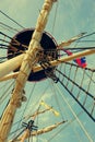 Masts and rigging of an old wooden sailboat. Details deck of the ship Royalty Free Stock Photo