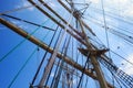 Masts of a sailing ship with the lowered sails. Royalty Free Stock Photo