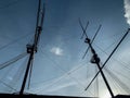 Masts for sails sailing ship against the sky silhouette Royalty Free Stock Photo