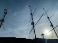 Masts for sails sailing ship against the sky silhouette Royalty Free Stock Photo