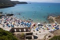 Masua Beach, Italy - August 19: Masua Beach in Nebida crowed in Royalty Free Stock Photo