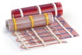 Mat electric floor heating system isolated on white. Heated warm floor. Underfloor heating