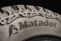 Matador - the logo of the tire company in close-up on the sidewall of the tire. Slovak company for the production of