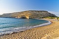 Matala beach and big rock with small caves, island of Crete