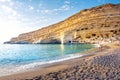 Matala beach with caves on the rocks, Crete, Greece. Royalty Free Stock Photo