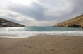 Matala, beautiful beach on Crete island, waves and rocks. Panorama Matala beach, Greece Royalty Free Stock Photo