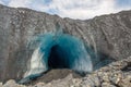 Entrance to a glacier cave in Alaska wildenness Royalty Free Stock Photo