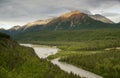 The Matanuska River cuts Through Woods at Chugach Mountains Base Royalty Free Stock Photo