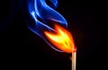 A match catching fire and burning Royalty Free Stock Photo