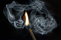 Match with fire and smoke Royalty Free Stock Photo
